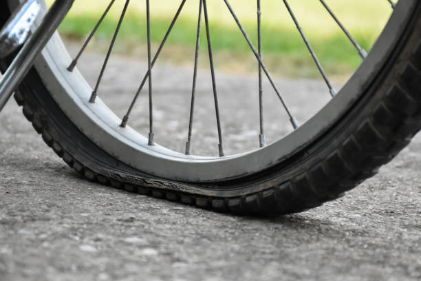 istock Bike flat tire 1871176287