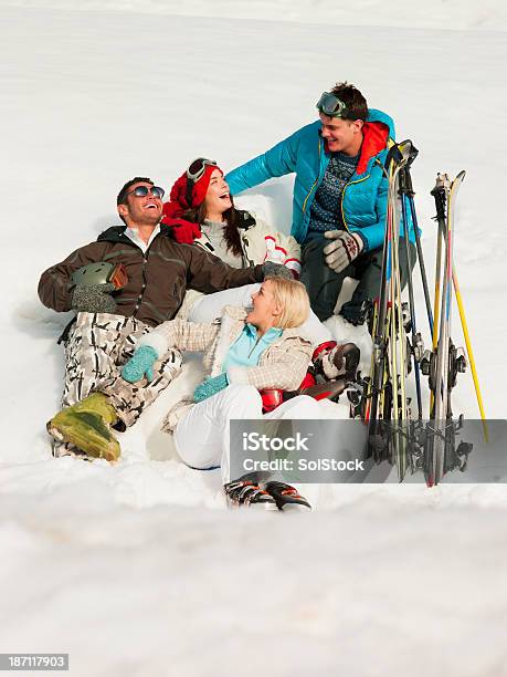 Skiers Sitting In Snow Stock Photo - Download Image Now - Skiing, Group Of People, Senior Adult