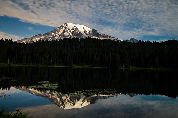 istock Mount Rainier at night, lit by the moon 187120674
