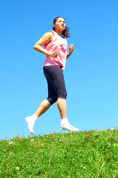 istock Mixed Race Woman Jogging 187120962