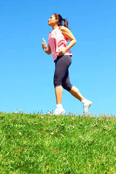istock Mixed Race Woman Jogging 187121734