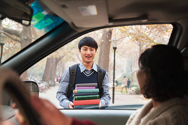 istock Family dropping off their son at college 187121831