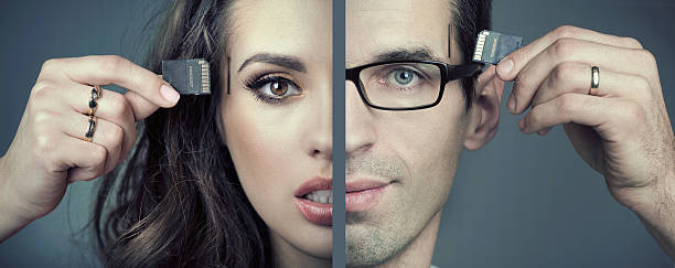 istock Man and woman inserting SD cards 187121983