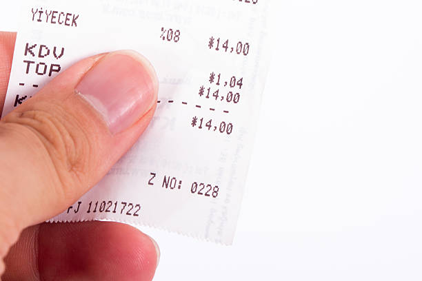 istock Hand Holding Cash Register Receipt 187122183