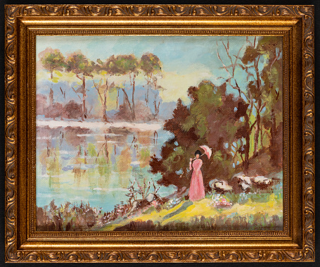 Framed acrylic sketch depicting a woman with umbrella against a natural landscape with a pond and trees. Traditional landscape painting.