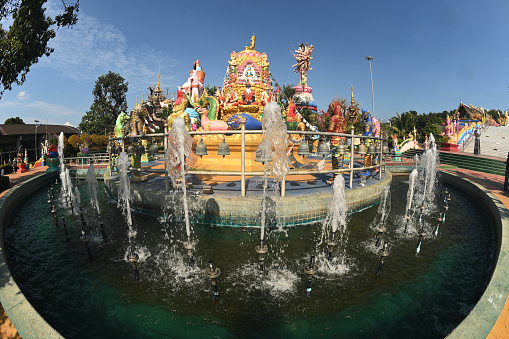 Large outdoor statues of Phra Phit Ganesha and Guan Yin Goddess Buddhist arts and various arts Inside Wat Saeng Kaew Phothiyan is a combination of worldly dharma, expressing the beliefs and culture of Buddhists. Located at Chiang Rai in Thailand.