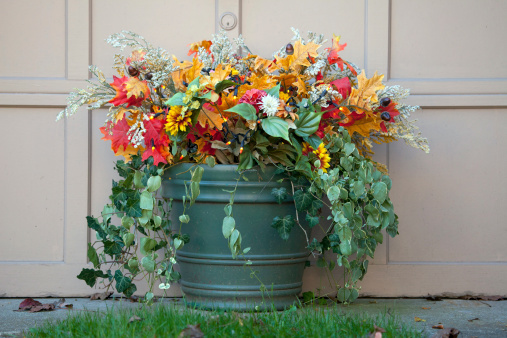 Decoration of autumnal flowers and leaves.