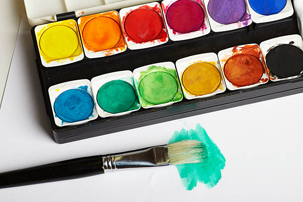 istock Watercolor paints with paintbrush 187124380