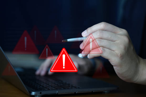 istock Emergency warning alert alarm on Smartphone, Data network protection, Virus alarm. 1871245799