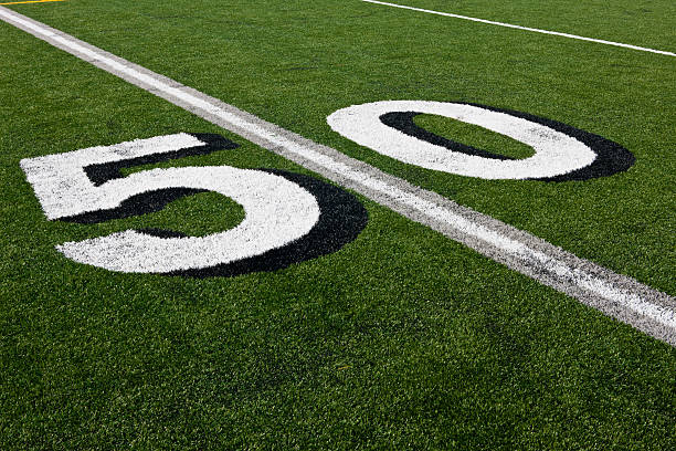 istock Fifty Yard Line on Football Field 187124728