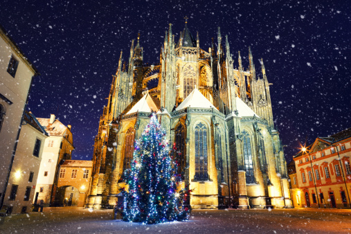 St. Vitus Cathedral in Prague on a snowy Christmas evening.