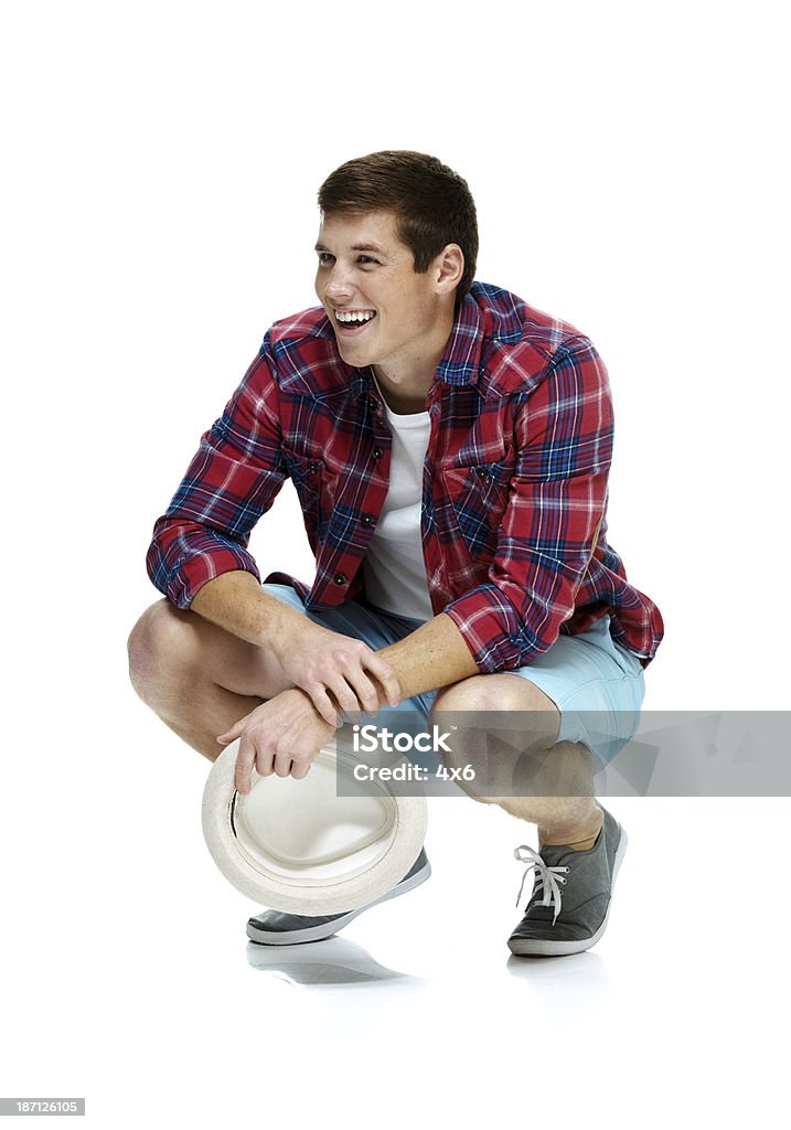 Happy young man in white background Happy young man in white backgroundhttp://www.twodozendesign.info/i/1.png 20-29 Years Stock Photo