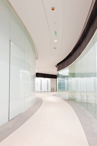 istock Interior corridor of modern office building 187126175