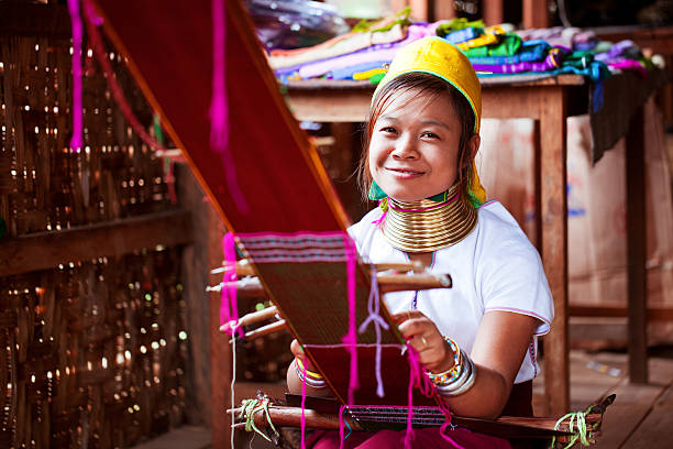 istock Long necked child engaged in manual work 187127074
