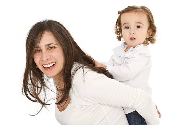 istock Mother and daughter looking at camera 187129080
