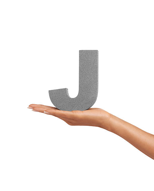 aquí es una "j" - forearm close up studio shot black and white fotografías e imágenes de stock