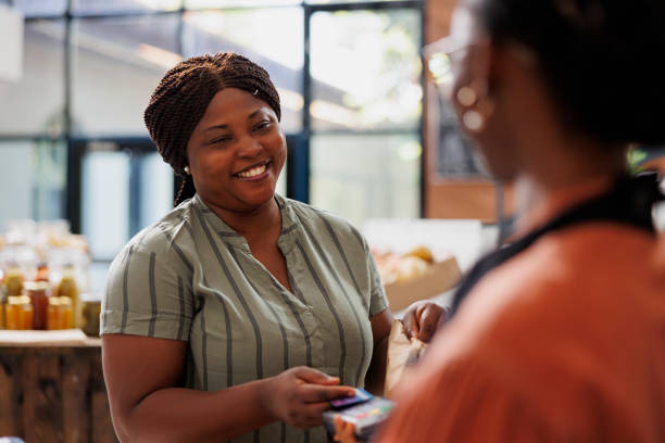 istock African american woman using mobile payment 1871295014