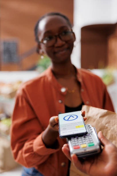 istock Contactless payment at eco-friendly market 1871298383