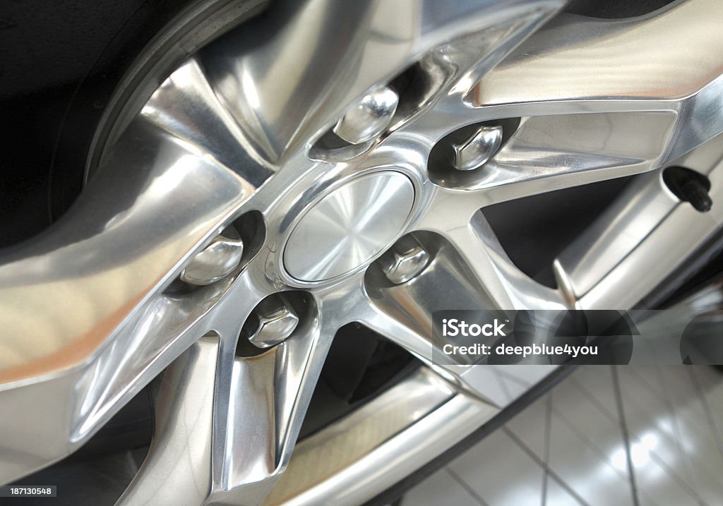 alloy wheel - Car rim on tire close up close up , angled view from the alloy wheel on a car - studio shot Alloy Stock Photo