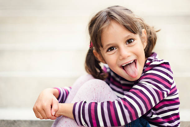 istock Playful little girl 187130960