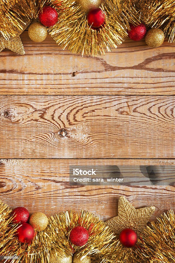 Christmas decorations on a rustic background with copy space Christmas decorations on a wooden background with lots of copy space. Celebration Stock Photo