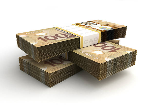 istock Stack of Canadian hundred dollar bills wrapped in bundles 187131082