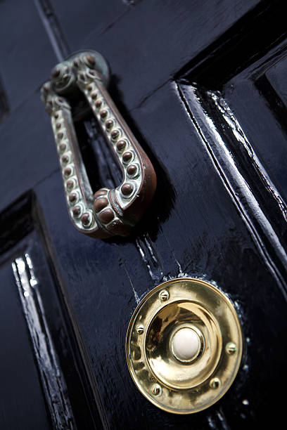 istock black door with knocker and ring bell 187131418