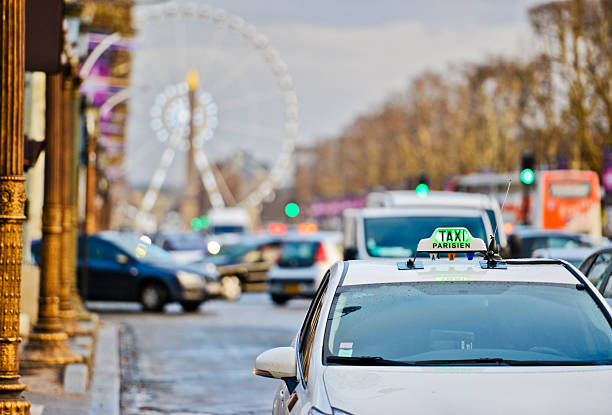 istock Parisian taxi on Champs-Elysees 187131539