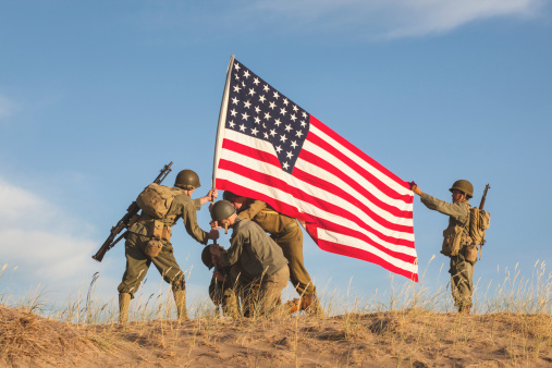 Soldiers Raising the US Flag (Stock Image)