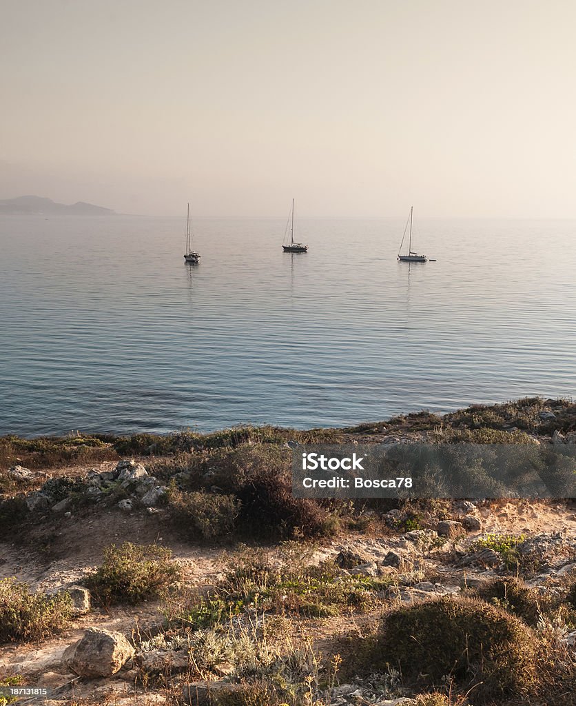 Atardecer en la playa - Foto de stock de Aire libre libre de derechos