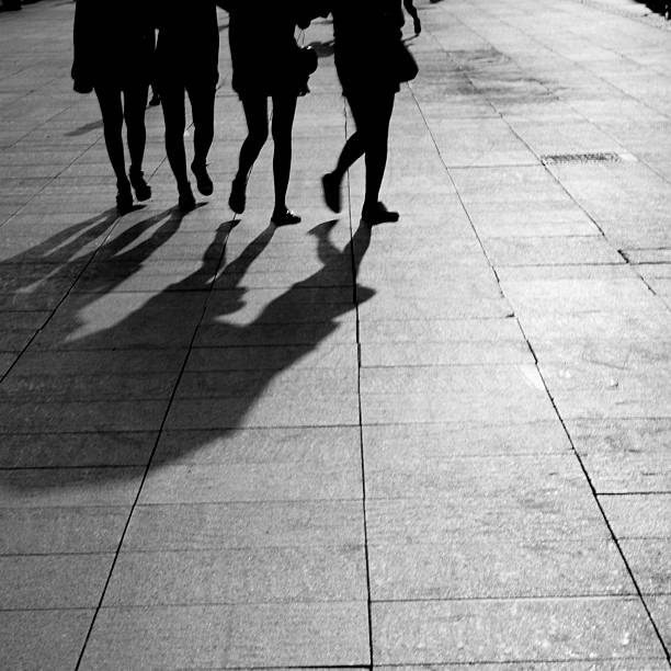 istock silhouettes and shadows of people walking 187131837