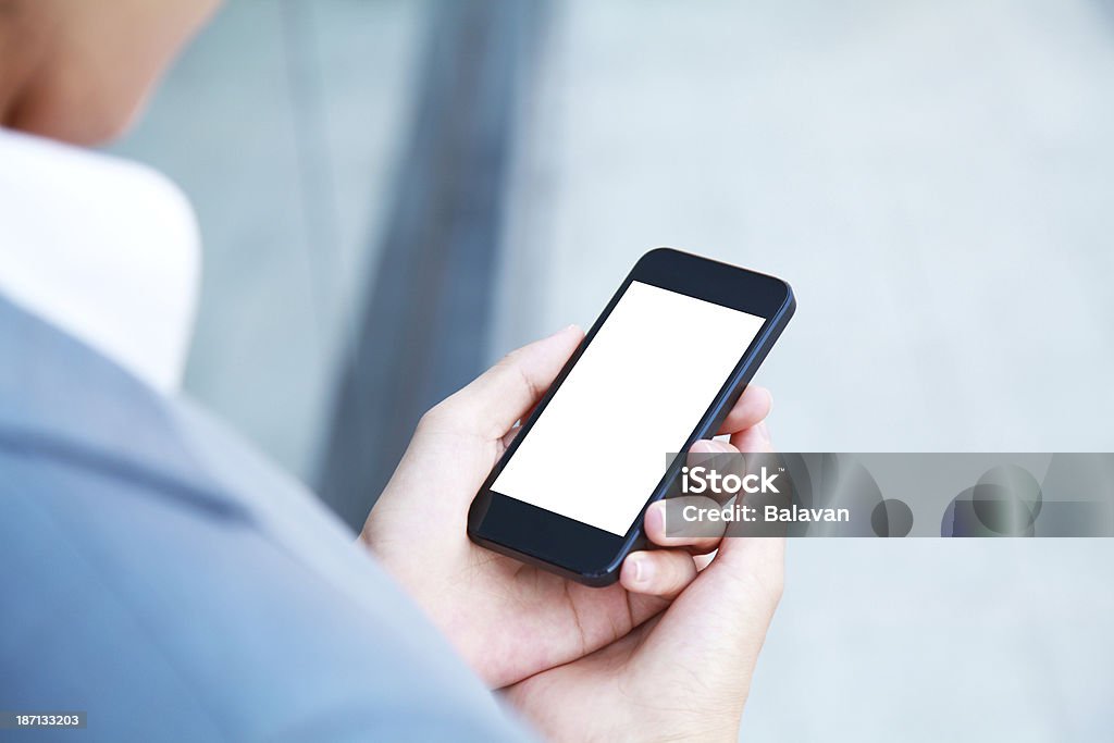 ビジネスの人々の手に空白の画面を持つスマートフォン - 手に持つのロイヤリティフリーストックフォト