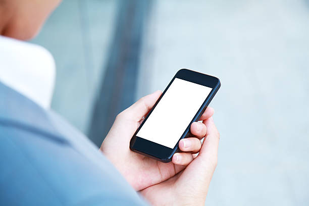 istock Business people hand holding blank screen smart phone 187133203