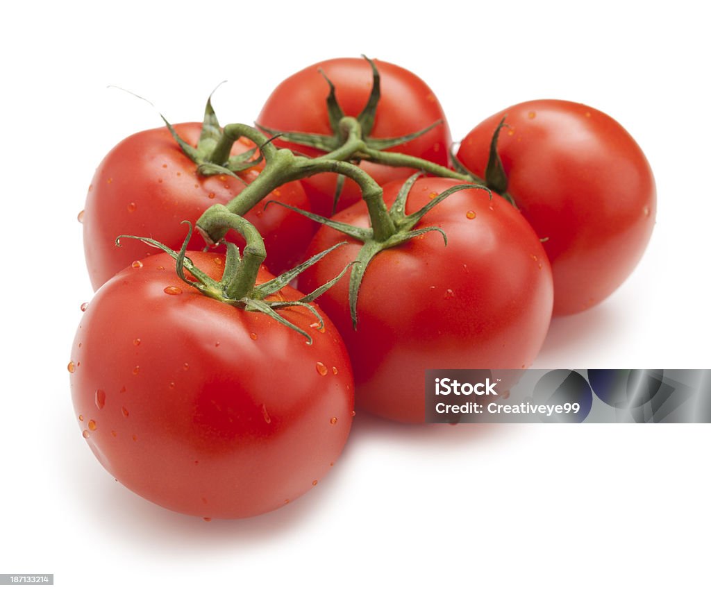 Tomates na vine - Foto de stock de Tomate royalty-free