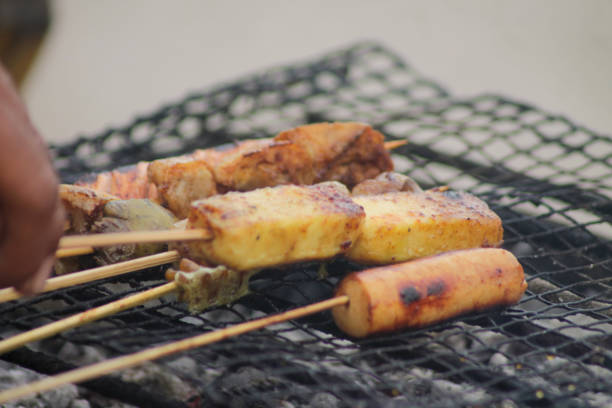 istock grilling bbq skewers at a food stall 1871336693