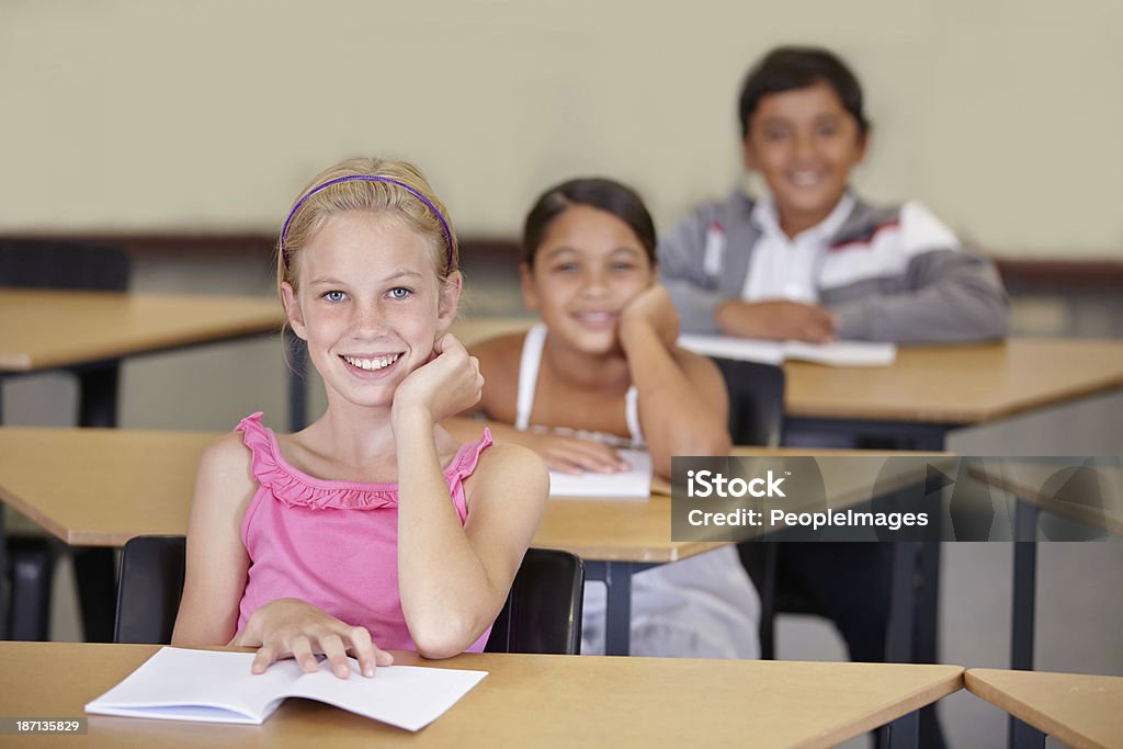 What the teacher likes to see School children sitting at their desk 10-11 Years Stock Photo