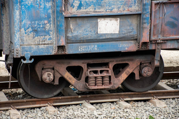 A closeup view of the wheels of a train 3rd December, 2023, Singapore Road, Orisa, India: A closeup view of the wheels of a train rusty old wagon detail stock pictures, royalty-free photos & images