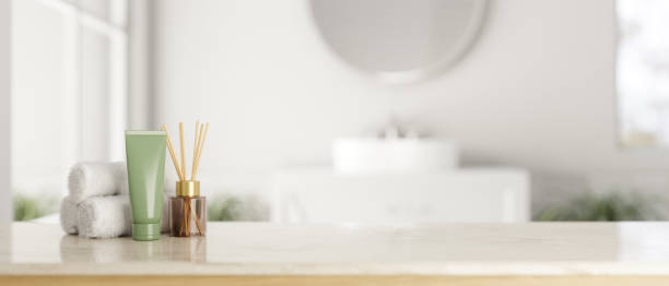 istock A white marble countertop with bath accessories with a blurred background of a modern white bathroom 1871412690