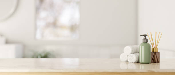 istock A white marble countertop with bath accessories with a blurred background of a modern white bathroom 1871412838