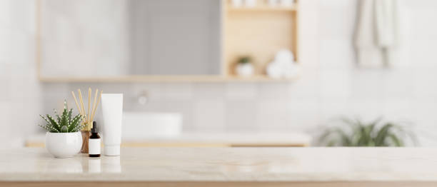 istock A luxury white marble tabletop with toiletries and copy space in a modern, minimalist bathroom. 1871414943
