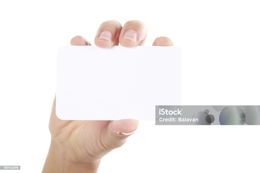 Mão segurando cartão de negócios sobre fundo branco - Foto de stock de Cartão de Presente royalty-free