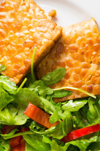 Tempeh is fermented soybean, it has a delicious buttery nutty flavor. The salad is rocket and bell pepper