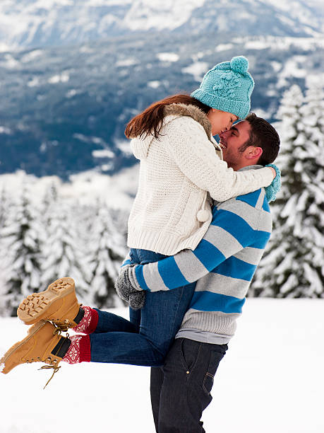 istock Young Couple In The Snow 187143472
