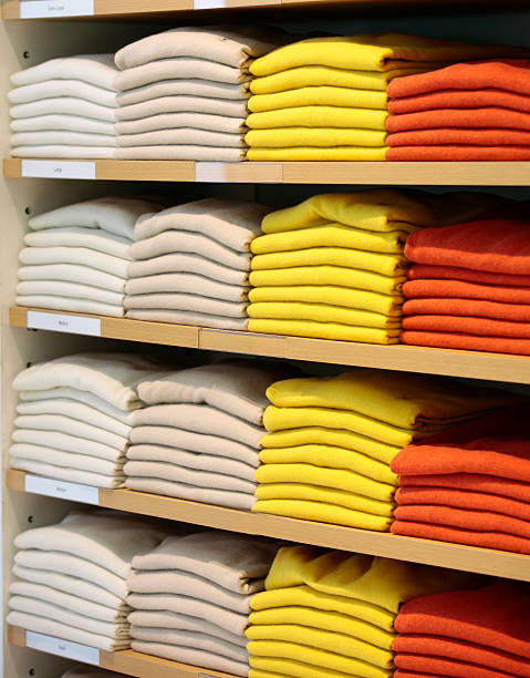 istock Colorful cashmere sweaters in clothing store. 187146123