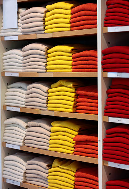 istock Colorful cashmere sweaters in clothing store. 187146125