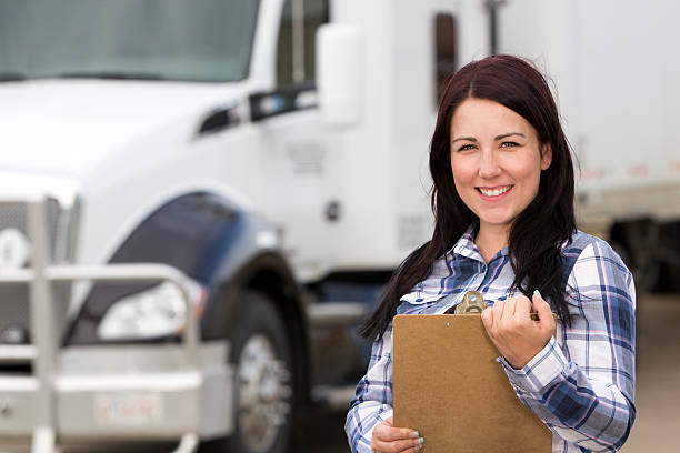 istock Female Truck Driver and Clipboard 187146150