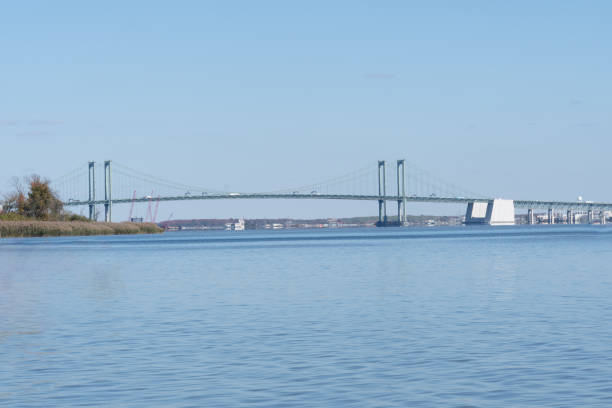 View of Delaware memorial bridge from the Delaware side on a bright sunny day during rush hour traffic
