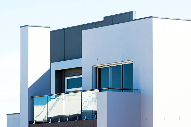 istock New modern white house with glass balcony, copy space 187148528