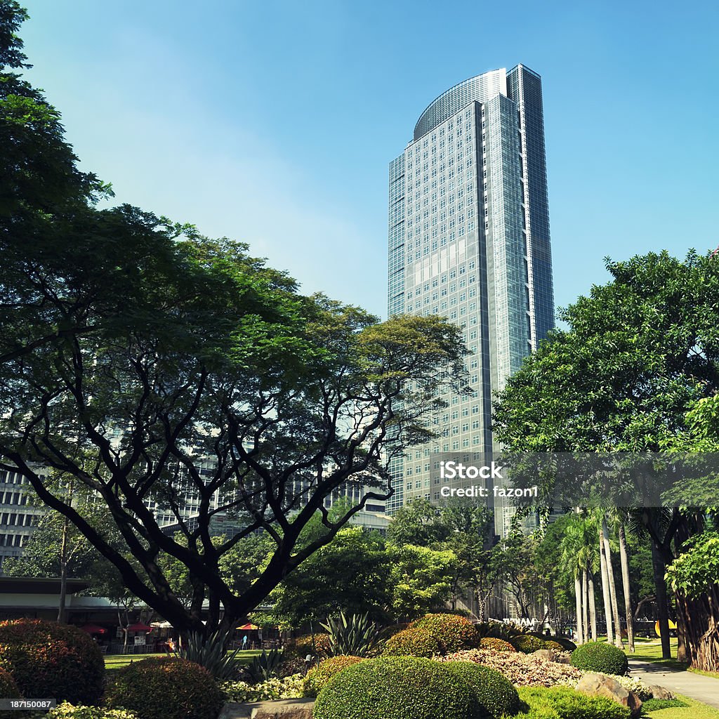 Philippine Stock Exchange Building, Manila - Philippines Ayala Tower One view from Ayala Triangle Gardens. It its one of the tallest building in the Philippines, (160 metres (525 feet)),  home of the Philippine Stock Exchange. Tower Stock Photo