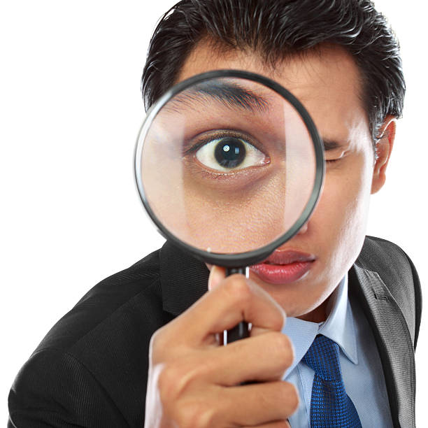 istock businessman with magnifying glass 187150402
